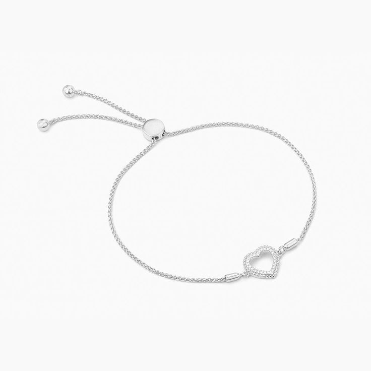 SKU# B-40068-W 9" Adjustable Bolo Chain Diamond Weight 0.05cts Heart Diameter 11.60 mm Thickness 2.30 mm Closure Bolo Finish 14k gold plated sterling silver or in sterling silver. Avoid contact with anything containing derivatives of alcohol. Feminine Bracelet, Vs1 Diamond, Beaded Heart, Chain Diamond, Bolo Bracelet, Heart Diamond, Heart Shaped Diamond, Demi Fine Jewelry, Chain Design