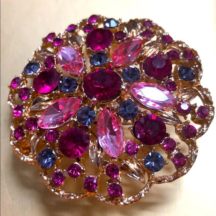 Pink And Purple Gold Overlay Broach. Covered In Rhinestones. Condition Is New In Box. Purple Rhinestone Brooches For Gifts, Purple Rhinestones Brooch As A Gift, Purple Rhinestone Brooches As Gifts, Purple Rhinestone Brooches As A Gift, Elegant Purple Rhinestone Brooches, Pink Crystal Brooches As Gift, Purple Rhinestone Party Brooches, Pink Rhinestone Brooches For Formal Occasions, Pink Rhinestone Party Brooch