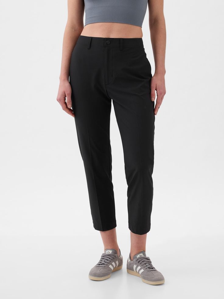 Soft stretch woven lightweight pants.  E-waist with button closure, zip fly.  Front slant pockets, back welt pockets.  This pant is made with 86% recycled polyester.  Using recycled materials helps to conserve resources and reduce waste.  This product was made in a factory that invests in gender equality and women’s empowerment.  Through RISE Reimagining Industry to Support Equality) and Gap Inc. ’s program P. A. C. E.  Personal Advancement & Career Enhancement), we support people who make our c High Rise Pull On Pants, High Rise Pants Outfit, Best Travel Pants, Pants Outfit Summer, Summer Pants Outfits, Style Uniform, Mom Clothes, Black Casual Pants, Travel Pants