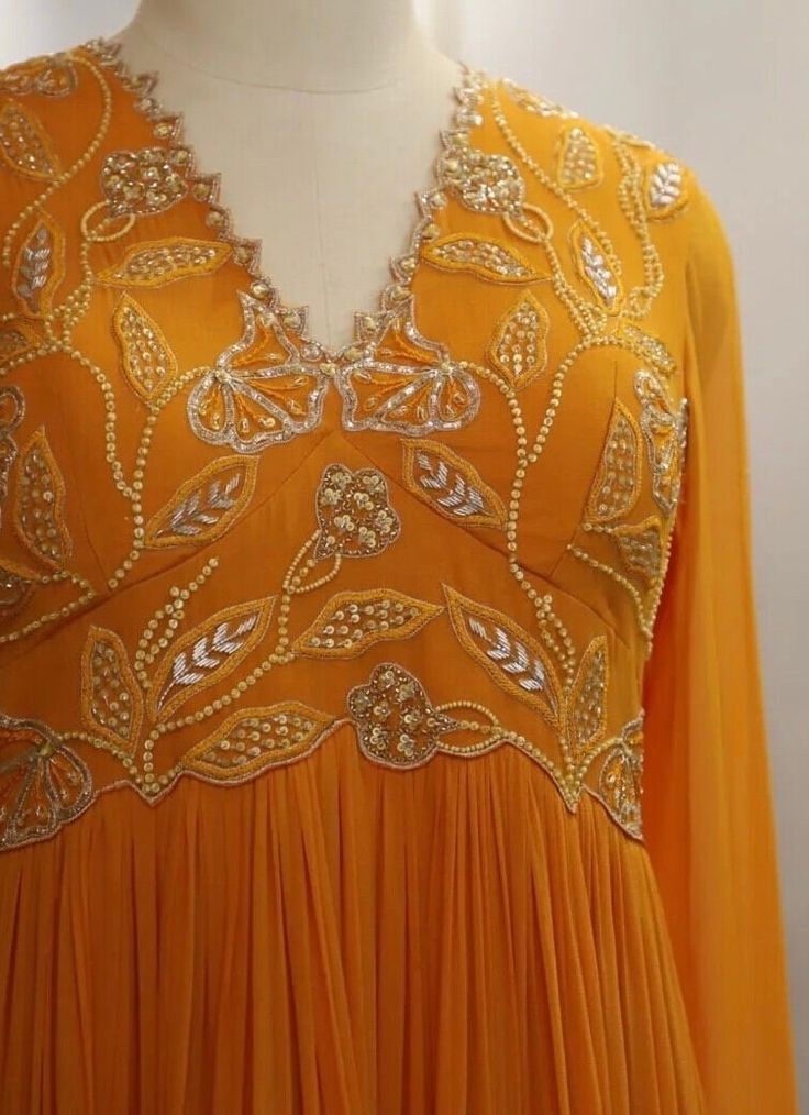 Yellow Long Sleeve Salwar Kameez With Dabka, Orange Long Sleeve Salwar Kameez For Eid, Yellow Georgette Kurta For Party, Yellow Salwar Kameez With Dabka And Long Sleeves, Orange Salwar Kameez With Dabka And Long Sleeves, Long Sleeve Orange Salwar Kameez With Dabka, Long Sleeve Orange Dabka Salwar Kameez, Long Sleeve Festive Dresses For Navratri, Festive Long Sleeve Dress For Navratri