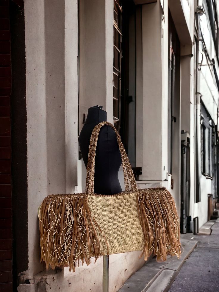 *With this straw bag you will always be stylish for everyday use, at the beach and wherever you want. *       Bag dimension 64x30 cm (widthxheight)  (25,19x 11,81 inches)  *      Bags full height is 61 cm - 24.01 inch                                            *Our bag is hand knitted, embroidered with paper string and lined with fabric. The tassel image is made with raffia rope. *It has a huge capacity and is strong enough to carry your belongings. *      With this bag you will attract all eyes Boho Style Bag, Boho Chic Design, Knitting Tote Bag, Knitting Tote, Mommy Bag, Straw Beach Bag, Wicker Bags, Straw Tote Bag, Fringe Bags