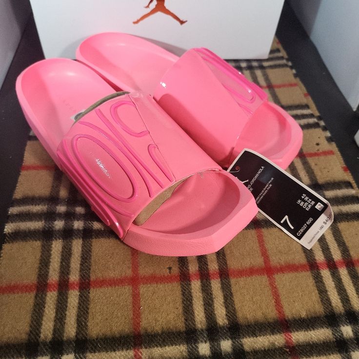 Size 7- Jordan Wmns Nola Slide. Fits Women Size 7, Men And Youth Size 5.5, Uk Size 4.5. New With Og All, Box Paper And 1 Shoe Trees, Hanger. Rip In Box. Ships Same Or Next Business Day. Check Out My Other Listings. I Got Js For Dayz And Designer Items As Well. Thanks For Looking!! #Nike #Nikeair #Airjordan #Jordan #Retro #Slidesjordan #Retro #Airjordan #Nikeair #Nike #Airmax #Airforce 1 #Dunkjz4dayznaz #Jordan #Retro #Airjordan #Nikeair #Nike #Airmax #Airforce 1 #Dunk Airmax95 #Airmax #Cortez #J Comfortable Sneakers With Air Cushioning, Pink Slip-resistant Sneakers For Summer, Trendy Open Toe Sneakers, Casual Synthetic Slides, Casual Pink Open Toe Sneakers, Spring Pink Open Toe Sneakers, Summer Sneakers With Air Cushioning, Summer Synthetic Sneakers With Air Cushioning, Sporty Slides With Air Cushioning For Sports