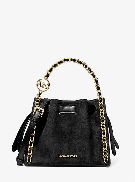 An everyday staple, our suede Mina bag will never go out of style. Defined by a compact silhouette and chain detailing for a touch of glam, it’s the perfect bag to throw over your shoulder for an easy transition from day to night. Suede Crossbody Shoulder Bag With Gold-tone Hardware, Chic Suede Bag With Metal Hardware, Chic Suede Shoulder Bag With Metal Hardware, Chic Evening Suede Bags, Evening Suede Bags With Detachable Strap, Michael Kors Crossbody Bag, Michael Kors Outlet, Michael Kors Crossbody, Bags Logo