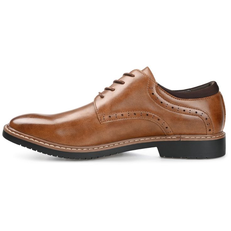 The dapper details on the Irwin derby by Vance Co. leave an impression. The uppers of this business casual derby are made of soft vegan leather and a traditional lace-up fastening. The design is grounded by an extremely supportive 6 mm Tru Comfort Foam footbed and a sturdy rubber sole. At Vance Co. our goal is to bring you shoes that will add texture and style to any outfit and give you that added confidence with every step you take. Fitted Wingtip Derby For Business Casual, Fitted Brogue Oxfords For Business Casual, Fitted Brogue Derby Shoes For Business Casual, Fitted Derby Shoes With Brogue Detailing For Business Casual, Spring Fitted Oxfords With Brogue Detailing, Fitted Wingtip Oxfords For Business Casual, Fitted Oxford Derby For Semi-formal Occasions, Fitted Oxford Lace-up Shoes For Spring, Fitted Oxfords For Business In Fall