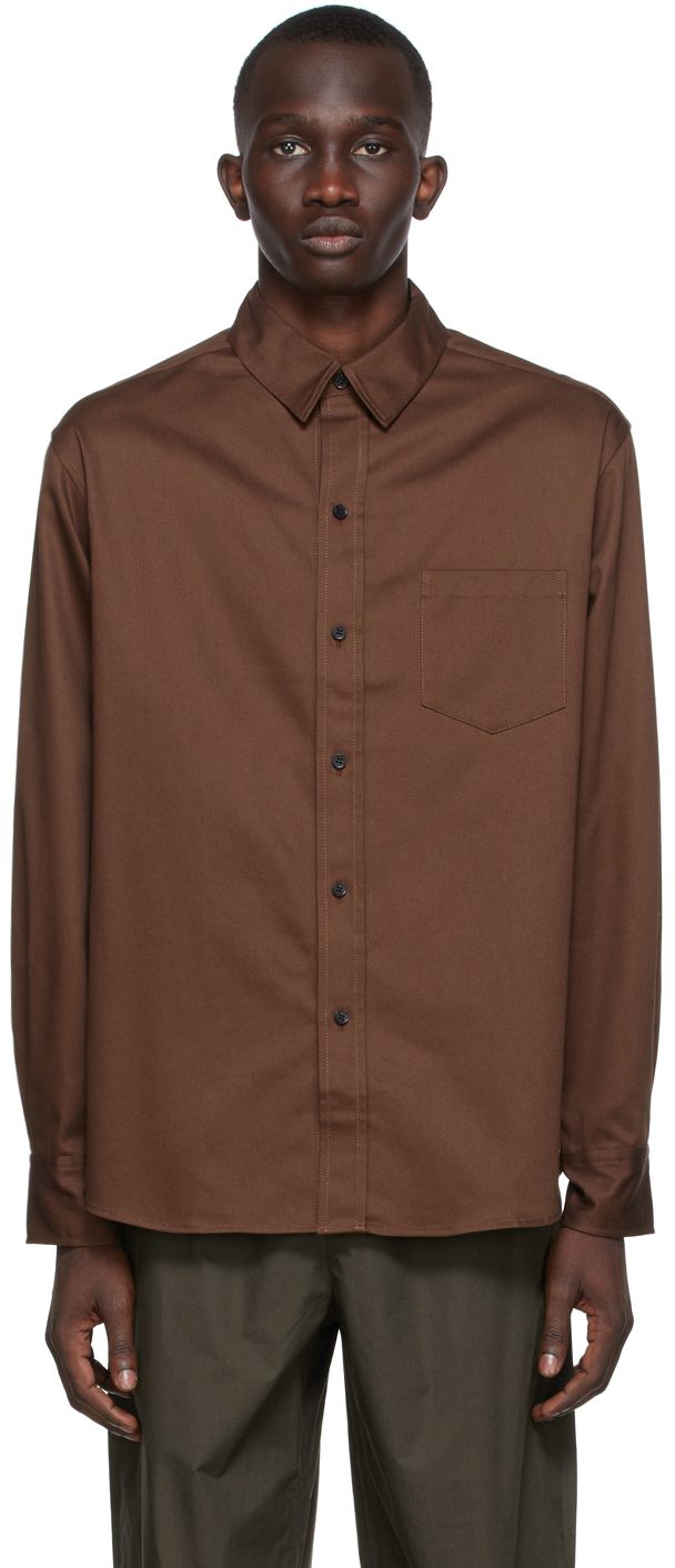 Long sleeve cotton twill shirt in brown. · Pointed spread collar · Button closure · Patch pocket at chest · Single-button barrel cuffs · Embroidered logo at side-seam Supplier color: Dark chocolate brown | Meta Campania Collective Brown Pablo Shirt Brown Shirt, Dark Chocolate Brown, Twill Shirt, Sleeve Cotton, Chocolate Brown, Dark Chocolate, Cotton Twill, Patch Pocket, Black Shirt