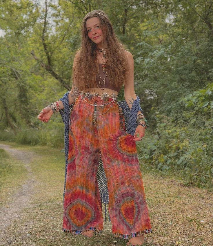 Cotton Palazzo Pants Tie Dye  These pants are made from soft and breathable cotton fabric, has a lightweight and airy feel, perfect for warm weather. The palazzo style features wide legs that flow freely, creating a relaxed and bohemian look. The tie-dye,Aztec patterns to the bottom hem and pockets creates a beautiful blend of colors, resulting in a visually appealing and eye-catching design.   The loose-fitting silhouette allows for ease of movement and provides a breezy feel. Whether you're go Hippie Pants Outfit, Look Hippie, Cotton Palazzo Pants, Palazzo Style, Pants Boho, Estilo Hippy, Hippie Style Clothing, Bohemian Look, Comfy Pants