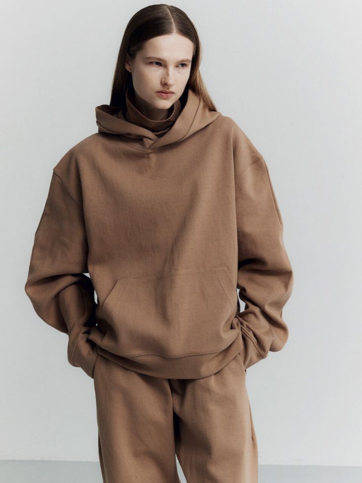 Editor's NotesLAGRANGE's oversized hoodie with a minimal yet trendy mood.- Pullover closure- Kangaroo pocket- Over-fit silhouette- Slightly cropped length- Versatile itemMeasurements(in.)S/M/L- Shoulder: 22.44 / 23.03 / 23.62 in.- Bust: 24.01 / 24.80 / 25.59 in.- Sleeve: 25.74 / 26.25 / 26.77 in.- Length: 25.39 / 25.98 / 26.37 in.Model infoMan - 6'16 Fitting size LComposition & Care- 70% Cotton, 30% Polyester- Please check the care labelDesigner- by LAGRANGE Fall Sweatshirt With Pockets And Drop Shoulder, Fall Drop Shoulder Sweatshirt With Pockets, Solid Color Sweatshirt With Pockets And Relaxed Fit, Everyday Fall Hoodie, Hooded Top With Pockets For Everyday, Brown Streetwear Sweatshirt With Pockets, Relaxed Fit Hoodie With Side Pockets For Everyday, Oversized Brown Tops With Pockets, Brown Sweatshirt With Ribbed Cuffs For Loungewear