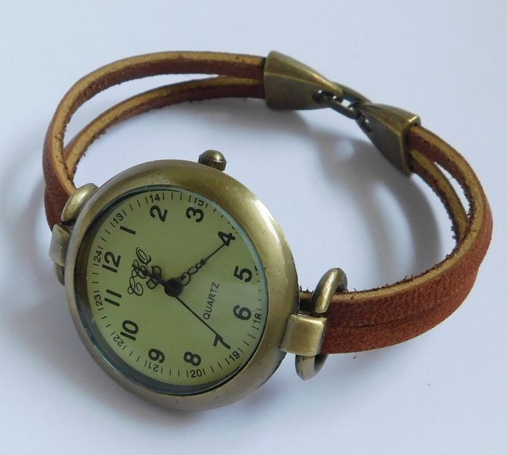 This is an unusual casual watch for woman. The watch head is made in alloy, free of nickel and lead, aged bronze finish, round shape, 1.25 inches diameter. The wristband is made with two piece of genuine oil tanned leather, treated with a protective coating to make it tear resistant and fire resistant. This kind of leather is the same used on logger boots. The closure is made in alloy, also aged bronze finish, folding over type. Comes in 8 sizes:   XS    for a 6.00 inches wrist      S    for a 6 Cheap Leather Watch Accessories, Cheap Brown Watch Accessories For Gift, Cheap Everyday Brown Watches, Cheap Brown Watches, Cheap Brown Everyday Watches, Cheap Retro Analog Watch Accessories, Vintage Watch Claw, Luxury Vintage Handmade Watch Accessories, Cheap Vintage Watches With Bracelet Strap