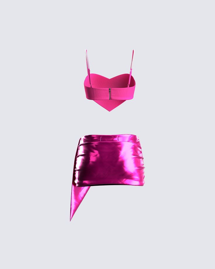 The party don’t start till you walk in wearing this iconic two-piece set 💗 With a pink heart crop top paired with a matching metallic mini skirt - this fit will turn you into the star of every occasion 💅 Pink Crop Top For Club In Summer, Chic Pink Crop Top For Club, Pink Crop Top For Spring Party, Glamorous Pink Crop Top For Summer, Flirty Pink Crop Top For Party, Trendy Night Out Sets Mini Length, Pink Two-piece Crop Top For Summer, Trendy Night Out Sets In Mini Length, Trendy Mini Length Night Out Sets