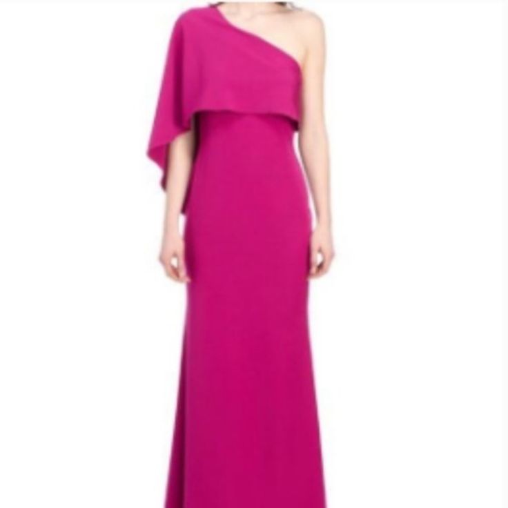 Here Just In Time For Wedding Season, This Stunning Gown From Vince Camuto Is Tailored With An Asymmetrical Neckline With A Single Draped Caplet Sleeve For A Silhouette That Feels Plucked From The Runways. Features Asymmetrical Neckline Single Cape Sleeve Layered Side Zip Length: 60" Shell: Polyester/Spandex; Lining: Polyester Color: Fuchsia Pre-draped Fitted Evening Dress For Wedding Guest, Asymmetrical Spring Evening Dress For Formal Occasions, Fitted Pre-draped Wedding Evening Dress, Asymmetrical Wedding Dress With Sweep Train, Asymmetrical Sweep Train Wedding Dress, Asymmetrical Evening Dress With Sweep Train For Wedding, Asymmetrical Evening Dress For Spring Wedding, Spring Wedding Gown Pre-draped Style, Spring Wedding Pre-draped Gown