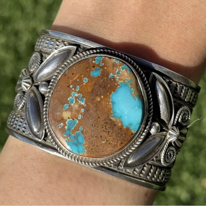 Native American Sterling Silver Blue Royston Turquoise Cuff Bracelet. Artist: Andy Cadman Weight: 107 Grams Gap: 1 Inch Width: 1.5 Inch Inside Measure: 5.5 Inches Fits 6.5 Inch Wrist Deep Stampwork On The Cuff Best Offers Accepted! Silver Western Cuff Bracelet With Patina, Western Style Blue Cuff Bangle Bracelet, Southwestern Engraved Blue Cuff Bracelet, Southwestern Blue Concho Bracelets, Southwestern Blue Patina Cuff Bracelet, Southwestern Blue Cuff Bracelet With Patina, Artisan Blue Engraved Cuff Bracelet, Turquoise Bracelet Cuff, Royston Turquoise