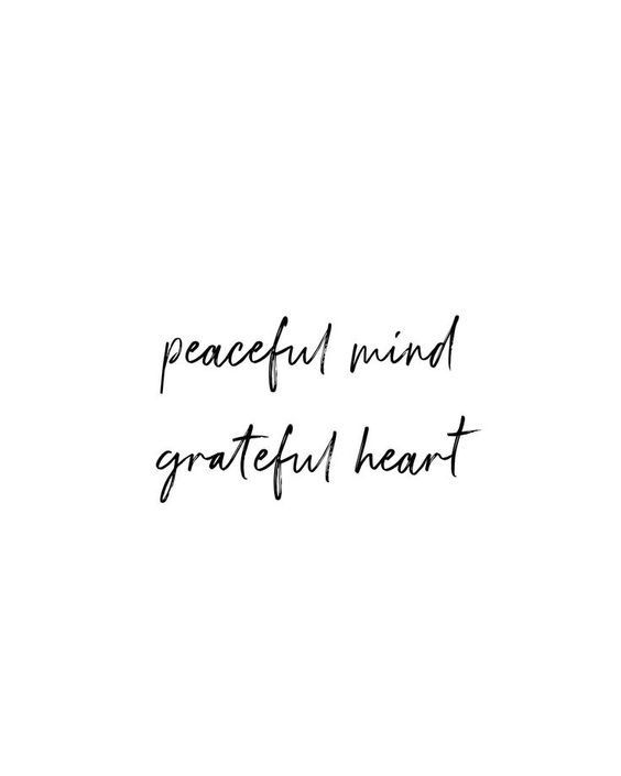 the words peaceful mind grateful heart written in black ink