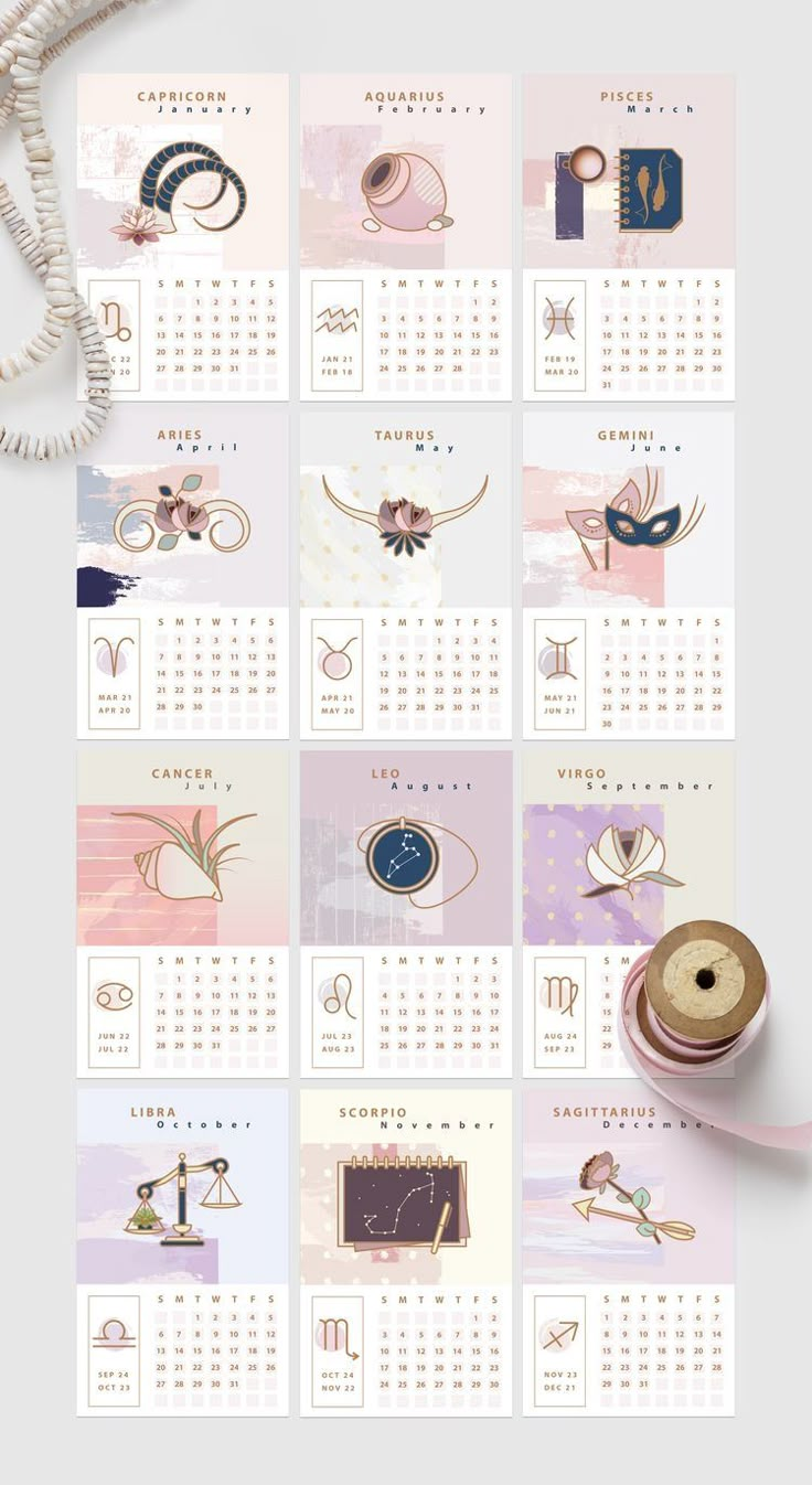 a calendar with various items on it and a necklace hanging from the top of it