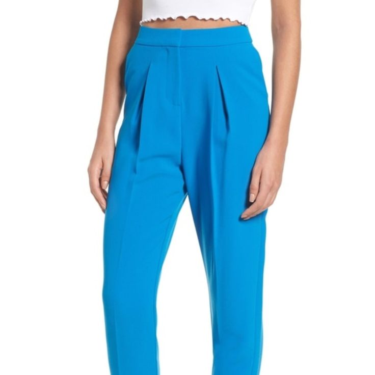 Size Info Topshop Us Sizes Shown. Order Size In Parenthesis For Best Fit. High Rise. Details & Care Look Clean And Lean In These Tapered Pants Styled With A Polished Belt, Flattering Front Pleats And A Perfectly Cropped Fit. 26" Inseam; 13" Leg Opening; 14" Front Rise; 17" Back Rise (Size 6) Front Belt Closure Side Pockets; Back Welt Pocket 94% Polyester, 6% Elastane Machine Wash, Dry Flat Chic Blue Bottoms For Spring, Chic Blue Tapered Leg Pants, Trendy Blue Ankle-length Pants, Trendy Ankle-length Blue Pants, Blue Pants For Workwear Suitable For Spring, Blue Pants For Spring Workwear, Spring Blue Workwear Pants, Peg Trousers, Look Clean