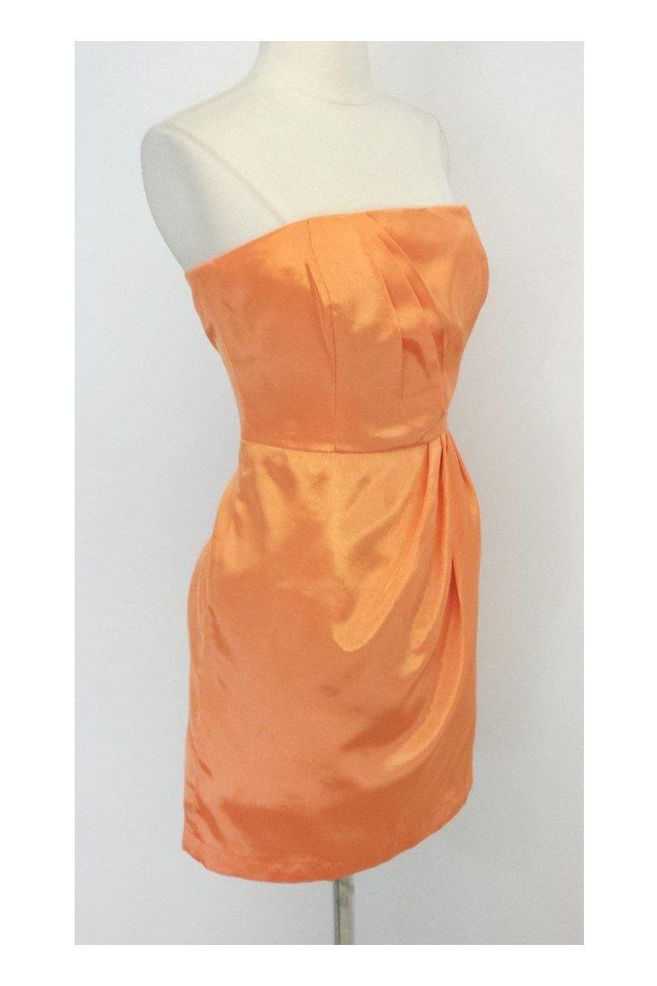 Size 8 Strapless Pleat Dress in Orange Sherbet Retails for $305.00 Body 100% Polyester Lining 100% Acetate Made in the USA Concealed back zip and clasp Pleat detail on bust and below waist On seam hip pockets Bone in bodice Across top of bust 16.5" Under bust 15.25" Bust to hem 19.25" Hips 38.5" Total length 28" Orange Satin Evening Dress, Orange Party Dress With Sweetheart Neckline, Summer Silk Strapless Formal Dress, Summer Silk Strapless Dress For Formal Occasions, Silk Strapless Dress For Summer Formal, Formal Silk Strapless Mini Dress, Summer Formal Silk Strapless Dress, Fitted Orange Dress With Sweetheart Neckline, Elegant Strapless Dress With Side Zipper