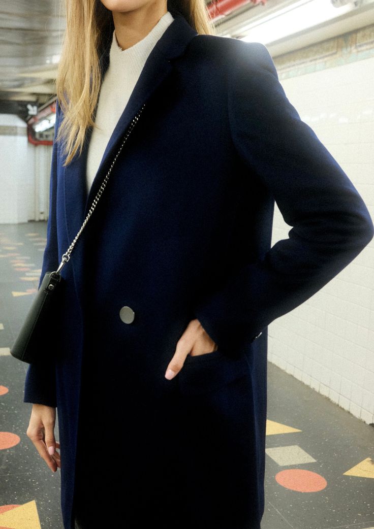 The perfect blue wool coat. Its loose fit is ideal for layering. A chic alternative to keep warm. It is lightweight and warm, making it the perfect transeasonal wool coat. The Navy blue tone is very chic, specially when worn with black or neutral colors. Great freedom for styling! 100% super soft wool Deep pockets with flap details Fully lined in 100% silky viscose fabric True to size Also available in green Chic Wool Outerwear For Layering, Elegant Winter Outerwear For Everyday, Elegant Everyday Winter Outerwear, Chic Blue Double-breasted Pea Coat, Chic Wool Peacoat For Office, Blue Pea Coat For Business In Fall, Chic Wool Peacoat For Fall, Chic Blue Pea Coat With Lapel Collar, Chic Wool Peacoat