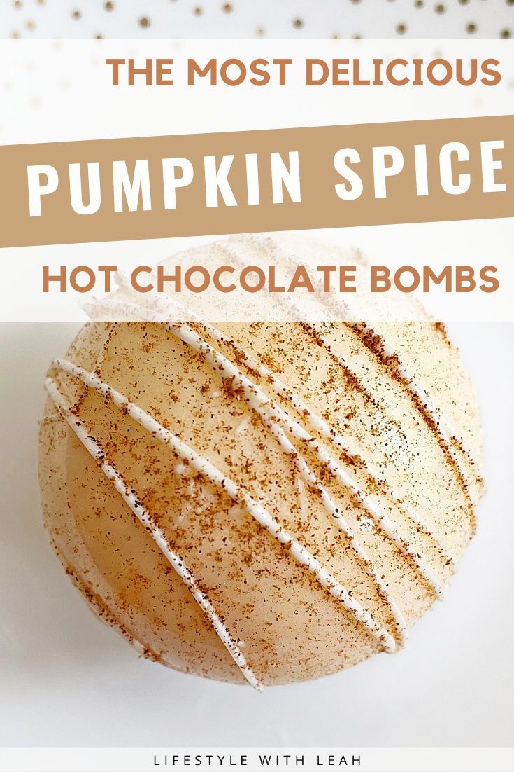 the most delicious pumpkin spice hot chocolate bomb recipe on a white plate with sprinkles