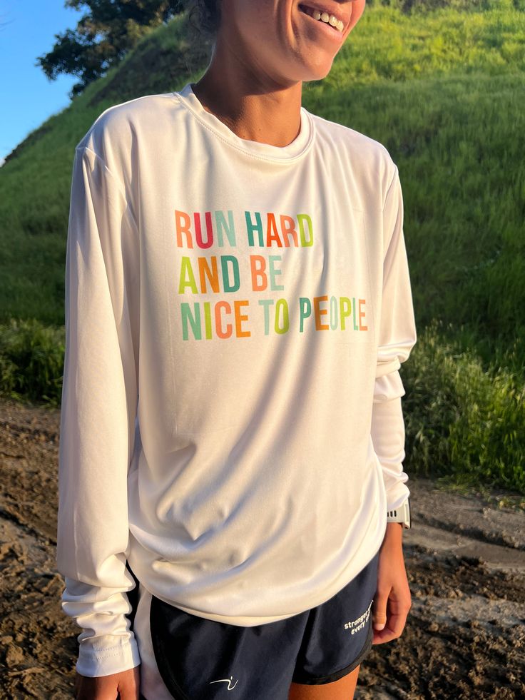 The Run Hard Performance Long Sleeve is the perfect addition to your running collection. Built for the mild springtime temperature, this sweatshirt will keep you cozy during all of your activities. Color: White Fabric: 100% Moisture-wicking Polyester Fit: Unisex Fit Running Long Sleeve, Outdoor Athleisure Activewear Crew Neck, Outdoor Sportswear Tops With Letter Print, Relaxed Fit Activewear For Outdoor With Crew Neck, Relaxed Fit Outdoor Activewear With Crew Neck, Outdoor Relaxed Fit Crew Neck Activewear, Relaxed Fit Crew Neck Outdoor Activewear, Athleisure Letter Print Tops For Outdoor, Crew Neck Athleisure Activewear For Outdoor Activities