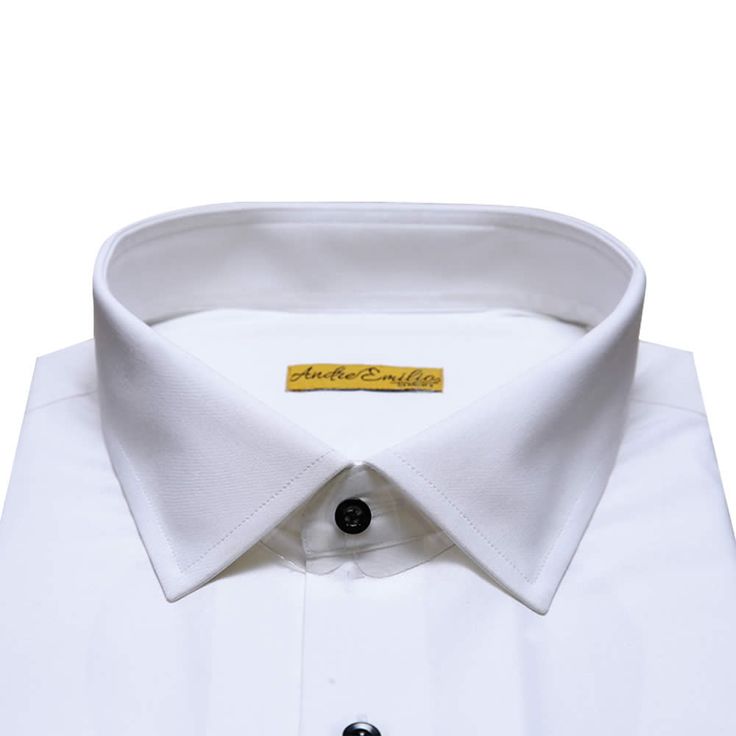 At André Emilio, we believe that every wardrobe should include a classic staple that transcends trends and showcases effortless style. Presenting the Bespoke Oxford White Shirt, a true icon of timeless elegance and unmatched versatility. Handcrafted with meticulous attention to detail, this shirt embodies the finest traditions of tailored craftsmanship. We have carefully selected premium oxford fabric renowned for its exceptional quality, durability, and luxurious feel against the skin. The cris White Long Sleeve Luxury Dress Shirt, Luxury White Long Sleeve Dress Shirt, Formal White Custom Fit Shirt, Elegant White Spread Collar Top, Elegant White Top With Spread Collar, Elegant White Semi-formal Shirt, Formal White Slim Fit Top, Formal Solid Shirt With Spread Collar, Classic Formal Cotton Tops