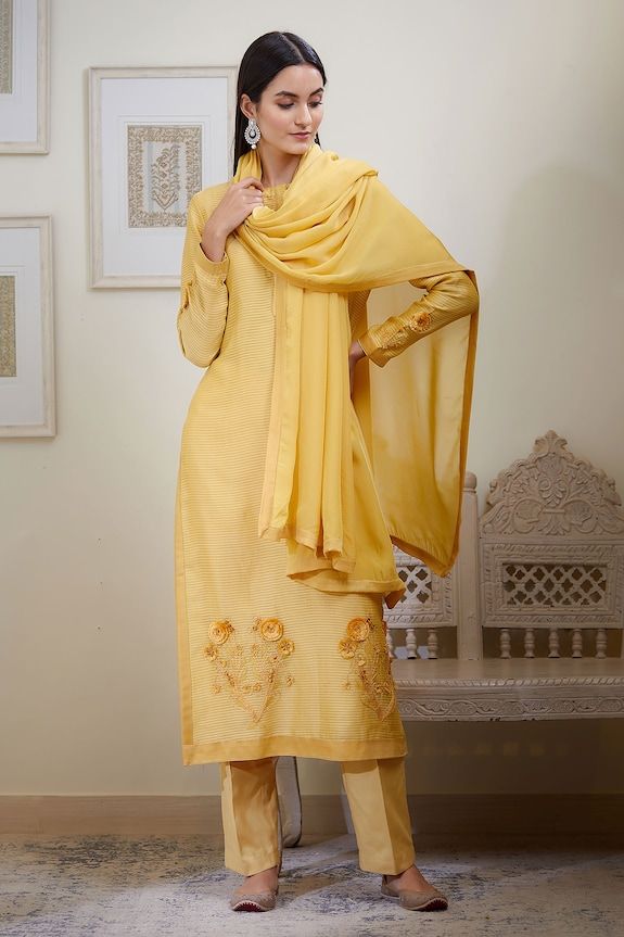 Mustard kurta with embroidered floral motifs on hem and sleeve hems. Comes with pant and sheer dupatta.
Component: 3
Embroidery
Neckine: Round
Sleeve Length: Bracelet
Fabric: Chanderi jacquard, Viscose
Color: Yellow - Aza Fashions Sheer Dupatta, Kurta Set For Women, Kurta Set, Floral Motifs, Set For Women, Aza Fashion, Floral Motif, Mustard, Custom Made