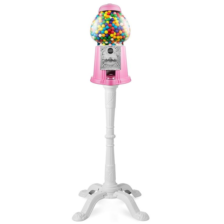 a pink gummy machine on top of a white stand with lots of balls in it