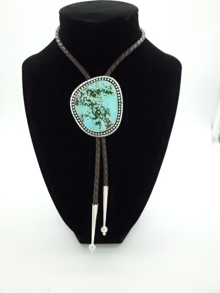 Stunning Chinese Oldstock Turquoise Bolo Tie. This piece features a gem grade Turquoise cabochon, set in sterling. Simple and timeless, this will certainly make a statement. The depth in this stone is just awesome.  All of the turquoise chosen for my bolo ties is absolutely some of the best old stock that can be found. Always priced fairly to ensure value, these are heirloom caliber stones. All acquired from the J. Julian estate collection. Mr. Julian's expertise and eye for beauty is evident in Adjustable Turquoise Jewelry With Large Stone, Blue Western Style Jewelry With Inlay, Western Style Turquoise Gemstone Jewelry, Western Blue Lariat Jewelry, Blue Lariat Western Style Jewelry, Blue Western Lariat Jewelry, Artisan Turquoise Cabochon Jewelry, Luxury Turquoise Cabochon Jewelry, Adjustable Western Style Gemstone Jewelry