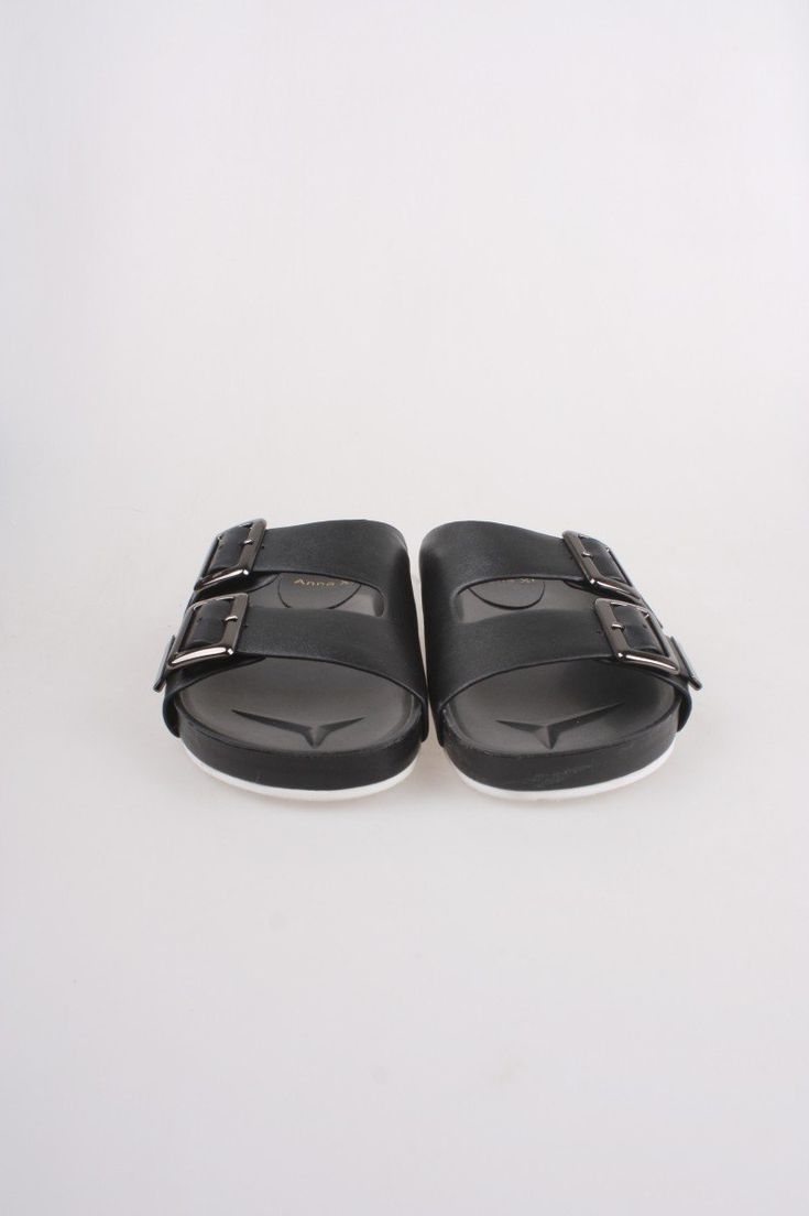 Marissa buckled sandal is comfy and trendy. Wear them with your jeans or shorts, you will look fab! 100% leather Casual Leather Footbed Sandals With Tang Buckle, Modern Sandals With Tang Buckle For Beach, Modern Beach Sandals With Tang Buckle, Casual Leather Sandals With Tang Buckle, Black Footbed Sandals With Tang Buckle For Summer, Casual Synthetic Footbed Sandals With Buckle, Trendy Double Strap Slides With Cushioned Footbed, Trendy Sandals With Rectangular Buckle Closure, Casual Open Toe Sandals With Buckle Closure