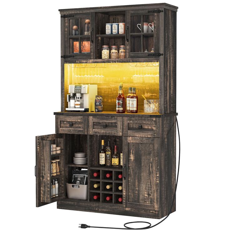 an open cabinet with bottles and spices on it