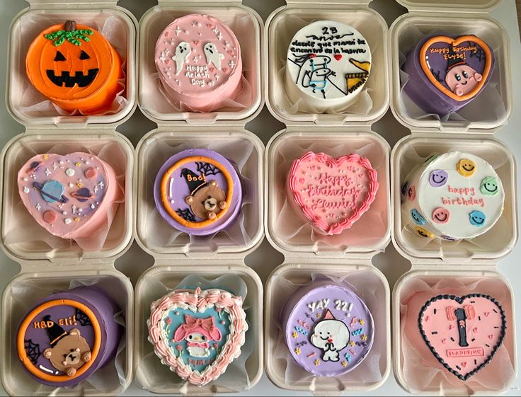 a box filled with lots of decorated cookies