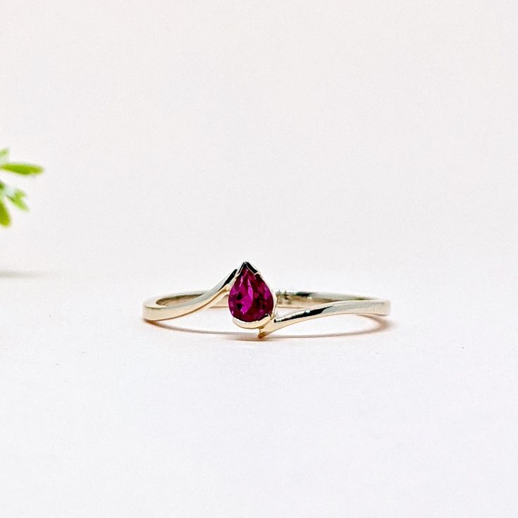 14K Solid Yellow GOLD Stackable One of a Kind Everyday Ring in 14k Gold For Her on Mothers Day from our Capsule Jewelry Collection. NATURAL RUBY Ring in 14k SOLID YELLOW GOLD. Ruby Pear Faceted Stone is set in Half Bezel Setting in our Factory. Gold Ring AAA+ Quality Ruby Precious Gemstone Ring. Etsy Handmade Jewelry, Handmade Ring For Wedding Gift , Engagement Gift  Anniversary Gift, Mothers Day Gift   (Stamped 585 /14k ) Ring. Perfect Gift For Everyday or Gift for a July Birthstone for Your Loved Ones. Christmas Gift  ►  DIMENSIONS : ◆ Gemstone : Ruby                                                                   ◆ Stone size : 3*5 mm                           ◆ Stone Shape : Pear                              ◆ Cut : Faceted  ◆ Gross Weight : 1.040 grams ◆ Stone Weight :  Ruby 0.30 Ct Teardrop Gemstone Ring For Formal Occasions, Elegant Pear-shaped Yellow Gold Birthstone Ring, Classic Teardrop Gemstone Rings, Fine Jewelry Crystal Promise Ring, Recycled Gold Wedding Ring With Round Cut, Solitaire Ruby Ring For Promise, Elegant Recycled Gold Diamond Promise Ring, Elegant Diamond Promise Ring In Recycled Gold, Fine Jewelry Gemstone Stackable Rings For Promise