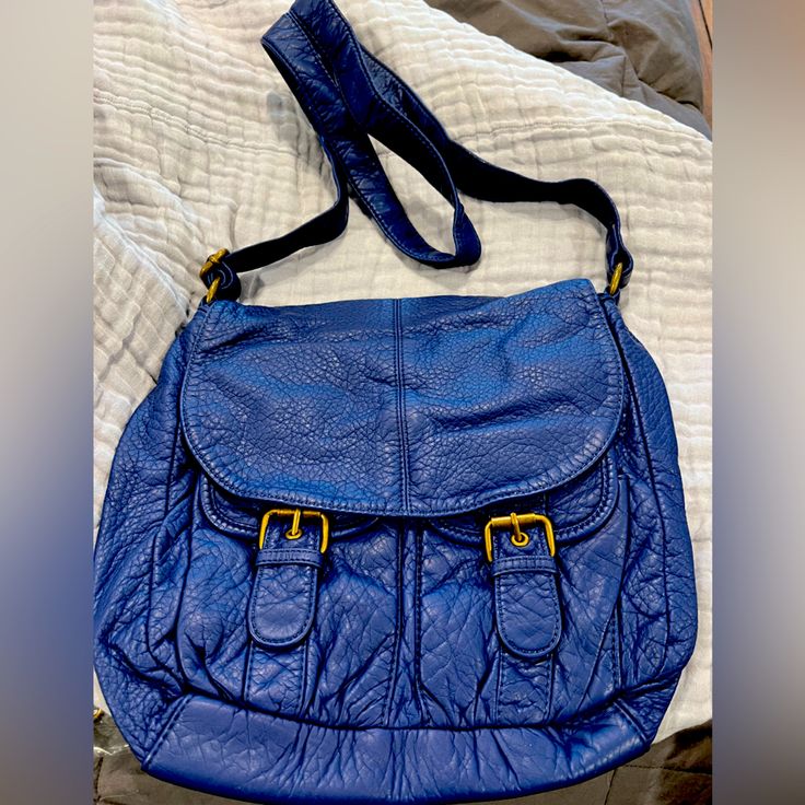 Royal Blue Vegan Leather Messenger Bag. Blue Soft Leather Satchel For Daily Use, Blue Soft Leather Shoulder Bag For Travel, Blue Soft Leather Satchel For Travel, Everyday Blue Soft Leather Satchel, Trendy Blue Travel Satchel, Trendy Blue Leather Satchel, Blue Satchel With Adjustable Strap For Daily Use, Trendy Blue Crossbody Satchel, Trendy Blue Leather Shoulder Bag