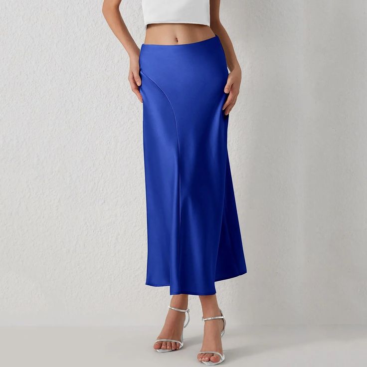 This Seasonal Fave Satin Long Midi Skirt is the new power player in our wardrobe! Features a high waistline, a figure-skimming silhouette with side pleated details for a chic look, and a flowy midi hem Comes in eight colors Made from quality Polyester Available in sizes S-L Model is wearing size S Fitted Solid Color Midi Bottoms, Party Solid Long Skirt Bottoms, High Waist Solid Color Evening Skirt, Elegant Solid Color Midi-length Bottoms, Blue Non-stretch Pencil Skirt, High Waist Pencil Skirt For Spring Evening, Solid Color Summer Evening Bottoms, Chic Solid Color Skirt, Blue Relaxed Skirt With Solid Color