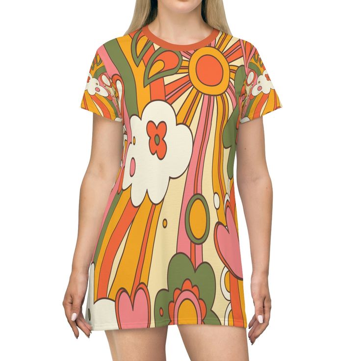 Ready to get Groovy? Stand out from the crowd in this Retro Groovy Hippie 70s Sunburst T-Shirt Dress and transport yourself back to the days of summer lovin' and peace, love, and harmony. The bold summer colors of burnt orange, mustard yellow, and green add a mid century modern feel that will have you looking oh-so chic whether it be for a party or just running errands. Tagless and cut to fit all sizes, this dress is perfect for any age. Plus, with its strong polyester fabric and side seams, this dress retains its shape longer so you can boogie all night. Get ready to disco down memory lane with this must-have Retro Hippie Sunburst Dress! Key Features 100% Polyester: This extremely strong and durable synthetic fabric retains its shape and dries quickly White thread color Light fabric (6.0 60s Clothing, 70's Party, Hippie Gifts, Flower Power Hippie, Hippie 70s, Hippie Boots, 70s Party, Hippy Gifts, Retro Groovy