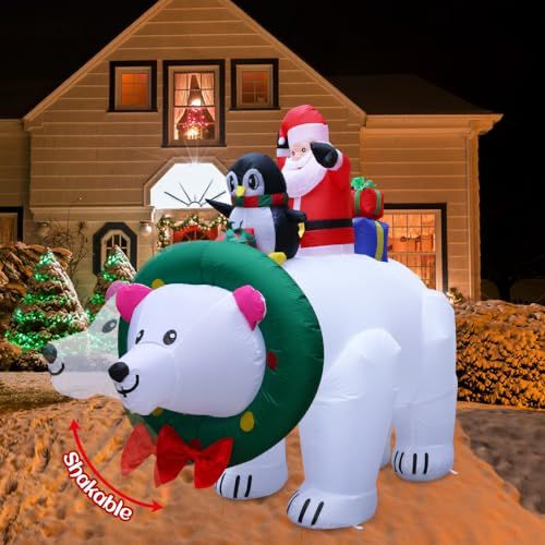 an inflatable polar bear and penguin christmas decoration