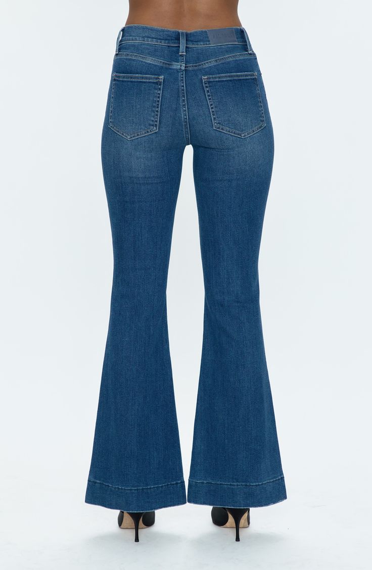 An on-trend high rise balances the flared legs of these retro-inspired jeans cut from premium low-stretch denim in a just-right wash. 32 1/2" inseam; 24" leg opening; 11" front rise; 13 1/2" back rise (size 29) Zip fly with button closure Five-pocket style 75% cotton, 13% rayon, 10% polyester, 2% polyurethane Machine wash, tumble dry Imported Mid-rise Medium Wash Flare Jeans, Chic Medium Wash Flare Jeans With Frayed Hem, Dark Wash Flares With Five Pockets For Fall, Spring Flared Hem Jeans With Frayed Edge, Flared Jeans With Frayed Hem For Fall, Fall Flared Jeans With Frayed Hem, Fall Jeans With Frayed And Flared Hem, Chic High Rise Flare Jeans With Frayed Hem, Trendy Medium Wash Flares For Fall