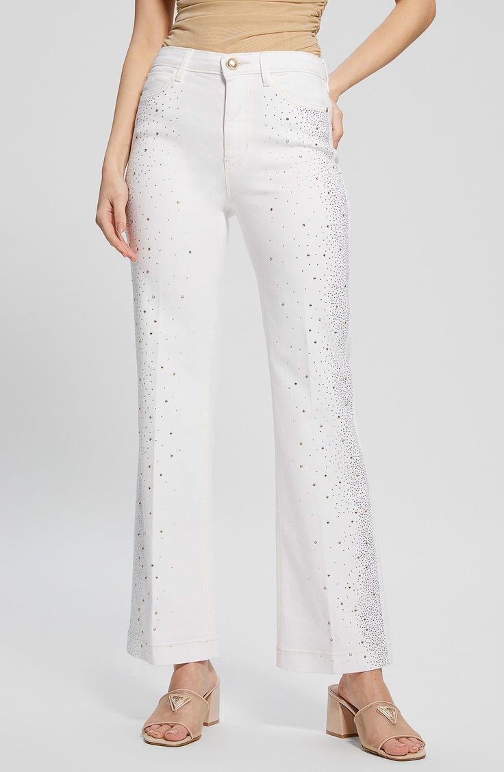 Rhinestone embellishment channels glam rock on these faded, straight-leg jeans cut from low-stretch denim. Zip fly with button closure Five-pocket style 92% cotton, 6% elastomultiester, 2% elastane Machine wash, tumble dry Imported Rhinestone Jeans, Kick Flare Jeans, Sequin Pants, Cropped Flare Jeans, Kick Flares, Rock On, Cropped Flares, Glam Rock, Guess Jeans