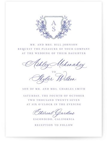 an elegant wedding card with the initials and monograms in blue ink on white paper