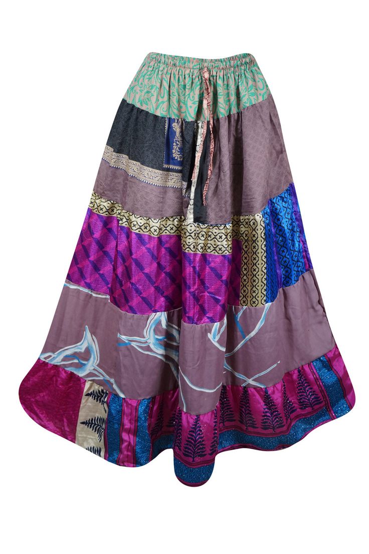 Unleash your inner fashionista with this maxi skirt made of recycled saree fabric in vibrant purple, blue, and floral prints. Featuring a drawstring waist and ankle length, it's perfect for farmer markets and beach festivals. Available in S/M/L, this boho skirt is both bold and sustainable, with its unique design and eco-friendly materials. Step out and make a statement at any adventure or event. Fabric:-Silk Blend, Recycle Silk Measurements: Length 38 inches, Waist up to 28-38 inches Care Instr Yoga Mala Beads, Beach Maxi Skirt, Beach Festival, Skirt Purple, Boho Skirt, Boho Pants, Vibrant Purple, Boho Skirts, Saree Fabric