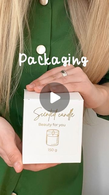 a woman holding a box with the words, packaging security cafe beauty for you on it