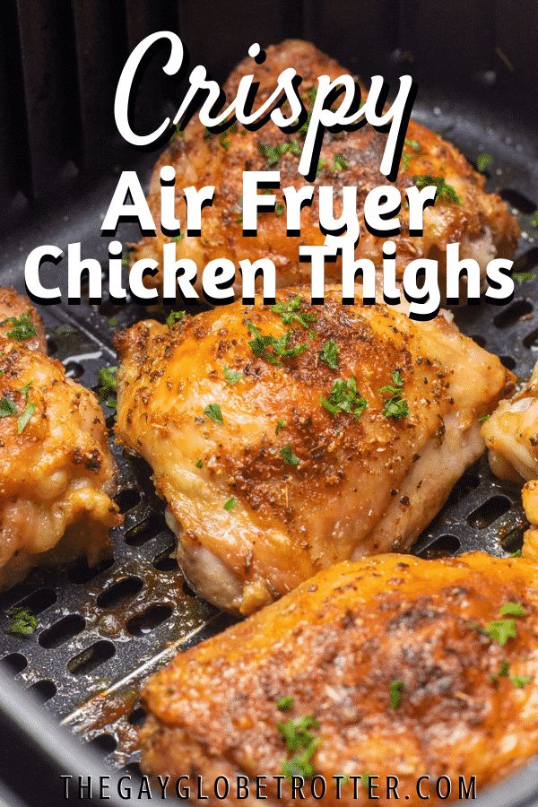 crispy air fryer chicken thighs with parsley on top and the words, crispy air fryer chicken thighs