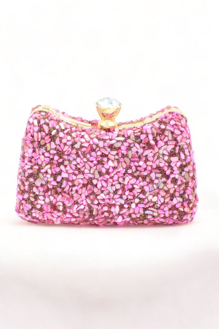 It has a 120 cm removable chain. It is lined. Dimensions: Width 17cm x Length 9cm / Depth: 5 cm Plus phones fit easily. Pink Rectangular Clutch With Chain Strap, Handheld Clutch With Chain Strap For Gift, Pink Party Shoulder Bag With Chain Strap, Pink Evening Bag With Detachable Strap For Parties, Pink Shoulder Bag With Chain Strap For Party, Pink Chain Strap Shoulder Bag For Party, Chain Strap Clutch Shoulder Bag, Pink Formal Pouch Bag, Glamorous Pink Evening Bag As Gift