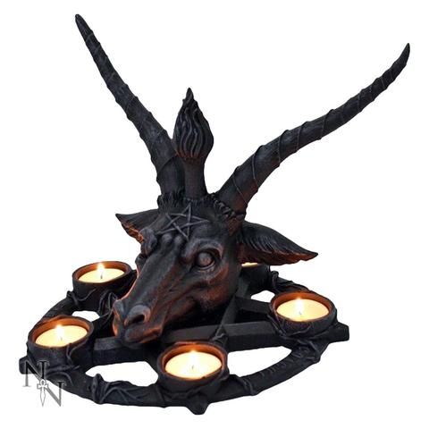 an animal head with candles in it's mouth and some lights on the side