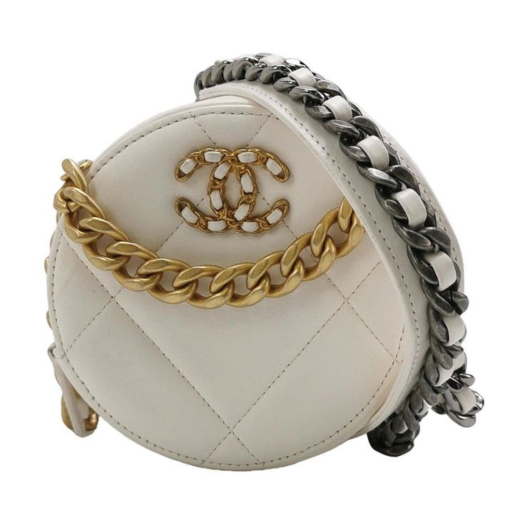 Chanel 19 Round White Cannage Leather bag These are professional photos of the actual bag offered by Luxbags. This super cute Chanel 19 Round White Cannage Leather bag is the perfect accessory for any ensemble! Its gold and silver metal chains give off that effortless glamour we all love, allowing you to stand out in the crowd! So why wait? Add this stylish bag to your wardrobe for an extra bit of pizzazz! Condition: Excellent. Hardly worn. 5"W x 5"H x 2"D 1" handle drop 23" strap drop Manufacture year: 2021 Mini Chanel, Chanel 19, Structured Shoulder, Circle Bag, Professional Photos, Bag Collection, Stylish Bag, Professional Photo, Metal Chain