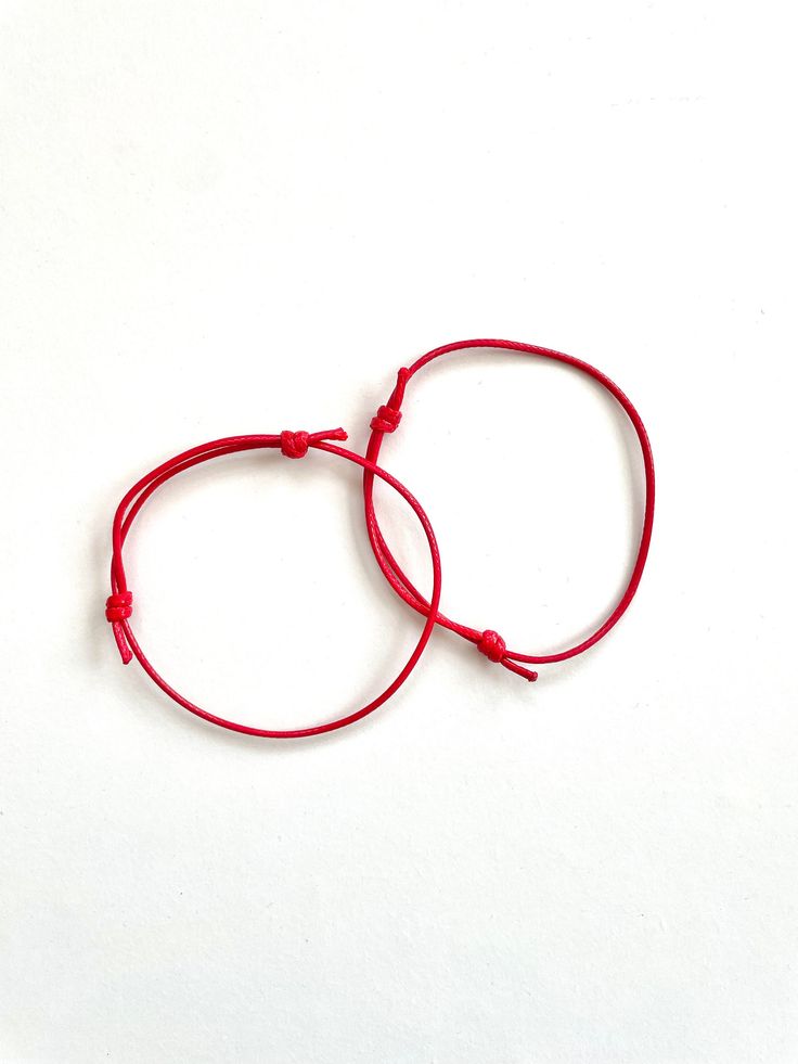 2 x Red String Bracelets, Red Protection Bracelet, Simple Cord Wish Bracelet, Protection Jewellery, Kabbalah Bracelet, Red Good Luck String 🌟 Features 🌟 Vibrant Red: Our bracelets feature a vibrant red waxed cotton cord that adds a pop of color to any outfit. Durable & Adjustable: The waxed cotton cord not only looks fantastic but is also durable, ensuring that your bracelets will withstand daily wear. Plus, they are adjustable to comfortably fit most wrist sizes. Versatile Style: These bracelets are versatile and can be worn individually or layered with other jewelry for a trendy, boho-chic look. Handcrafted with Care: I have carefully handcrafted each bracelet, ensuring they meet Feel And Believe high-quality standards. 🎁 Perfect Gift 🎁 These Red Waxed Cotton Cord Bracelets make a fa Red Braided Bracelets For Valentine's Day, Red Braided Friendship Bracelet With Sliding Knot, Red Braided Bracelet With Sliding Knot For Friendship, Red Sliding Knot Bracelet For Valentine's Day, Red Bracelet With Sliding Knot For Valentine's Day, Red Adjustable Cord Bracelet For Festivals, Adjustable Red Wristband Bracelet, Adjustable Red Bracelet Wristband, Red Spiritual Braided Bracelet With Adjustable Cord