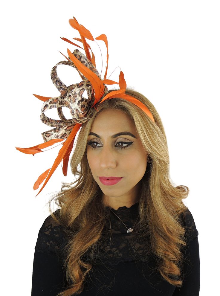 Gorgoeus loops with coque feathers Body measures about 8 inches wide With orange headband Unsure about colour? We send can send free colour samples anywhere in the world. Simply email us with colours and address. Samples can take a week to 10 days so be sure to ask early. Do you need your hat or fascinator in a hurry? We can deliver your hat or fascinator in 3 days via UPS to USA for $45 dollars via UPS and is a guaranteed service within 3 days. If you live in Australia, New Zealand or Asia, cos Spring Fascinator For Costume Party, Elegant Mini Hats For Kentucky Derby Costume Party, Elegant Hats For Carnival Costume Party, Adjustable Mini Hats For Carnival, Elegant Hats For Costume Party And Carnival, Elegant Fascinator For Royal Ascot Costume Party, Elegant Fascinator For Costume Party At Royal Ascot, Elegant Headpieces For Kentucky Derby Costume Party, Fitted Feather Fascinator For Events