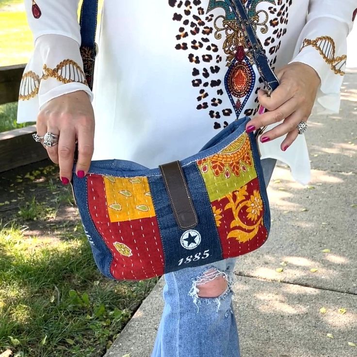 This Handmade Upcycled Canvas Crossbody Purse Bag is of an upcycled canvas. The trim is made of 100% genuine quality leather which is strong with a soft, natural, look and feel. Each bag is handcrafted with the spirit of vintage, ethnic, and bold style. The bag is sturdy and spacious, makes a great gift to your friend or family member you want to impress, and shows your unique taste and thoughtfulness. Constructed of canvas, this vintage-style tote is built for longevity and you are sure to get Daily Use Hand-stitched Crossbody Shoulder Bag, Hand-stitched Crossbody Shoulder Bag, Hand-stitched Crossbody Shoulder Bag For Daily Use, Eco-friendly Upcycled Bags For Daily Use, Hand-stitched Crossbody Bags For Daily Use, Hand-stitched Crossbody Bags For Everyday Use, Everyday Upcycled Rectangular Shoulder Bag, Casual Multicolor Upcycled Bags, Upcycled Everyday Rectangular Shoulder Bag