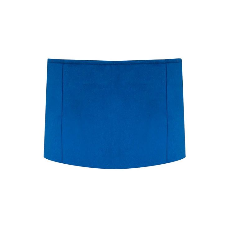 Made to order. Ships in 1 to 3 weeks. An essential addition to your wardrobe, this blue wool mini skirt is a must-have staple piece. The design is crafted to be low-waisted and features a small matching zipper for closure, adding a touch of simplicity and versatility to your closet. 100% Wool Care Instructions Hand was Lirika Matoshi, Wool Mini Skirt, Wool Skirt, Wool Skirts, Low Waisted, Blue Wool, Staple Pieces, Dog Clothes, 3 Weeks