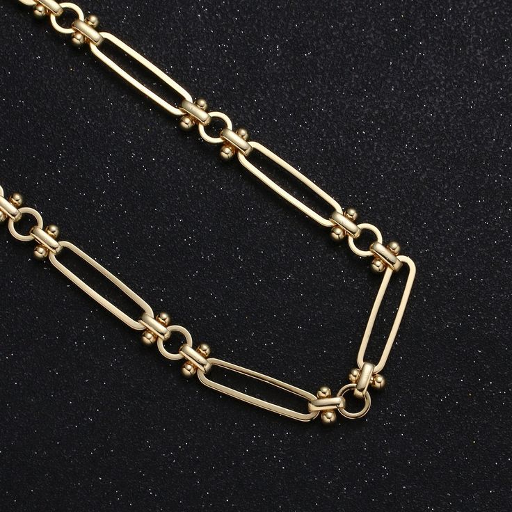 Item Details Material: Copper Based with 14K Gold Filled Chain Style : Roun Disc with moving balls and diamond cut connector Length : By Yard (3Feet) or at Your Choice Thickness: 3mm on Chain, Large Disc 21.9mmx 5.5mm (closed-soldered), Ball 2.9mm, rond circle 6 .1mm (closed-soldered). connector 6.5mm (open-unsodered) Please avoid chemical solutions, perfumes, excessive sweat, ocean water and pool water. Salt water and chlorine can damage your jewelry. Chlorine can damage and discolor metals tha Gold Metal Ball Chain Necklace, Metal Ball Chain Link Necklaces, Gold Satellite Chain Link Necklace, Gold Metal Satellite Chain Necklace, Charm Holder, Gold Chains For Men, Gold Chain Jewelry, Ocean Water, Small Charms