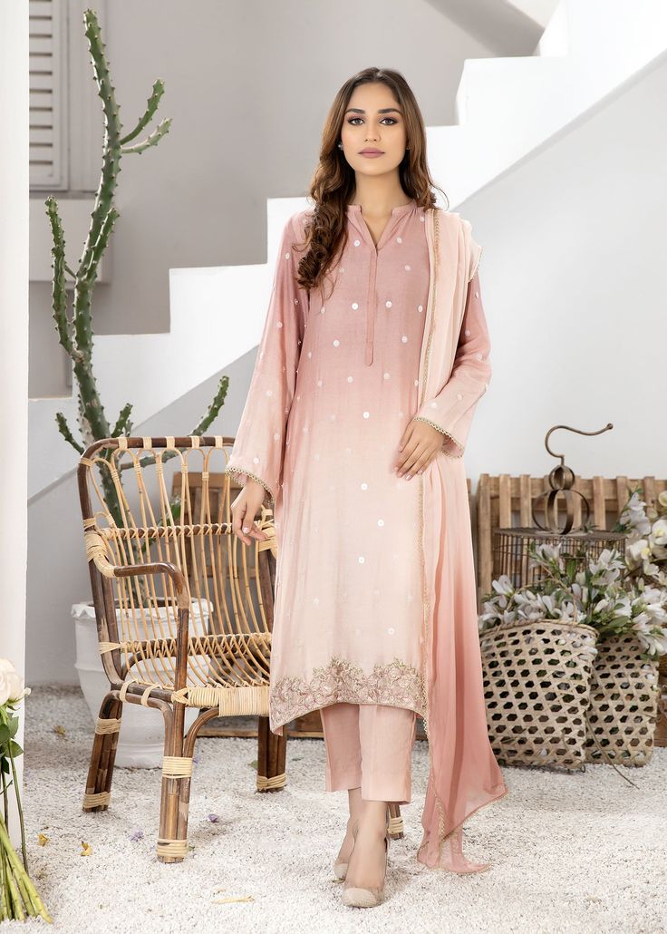 Tea pink pure cotton net shaded shirt handworked with sequins and beads all over. Comes with matching pure viscose silk pants. Pink Dabka Work Kurta For Party Wear, Pink Pant Set With Dupatta For Eid, Festive Pink Pant Set With Dupatta, Pink Bollywood Pant Set With Chikankari Embroidery, Pink Straight Kurta Pant Set For Designer Wear, Pink Dabka Dupatta For Party Wear, Pink Festive Party Wear Kurta, Festive Pink Silk Pant Set, Festive Pink Party Wear Kurta