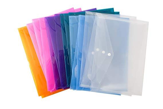 five different colored plastic bags on white background